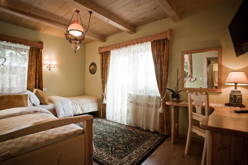 Четырехместный (Номер Делюкс) отеля Residence Bambi Boutique, Закопане