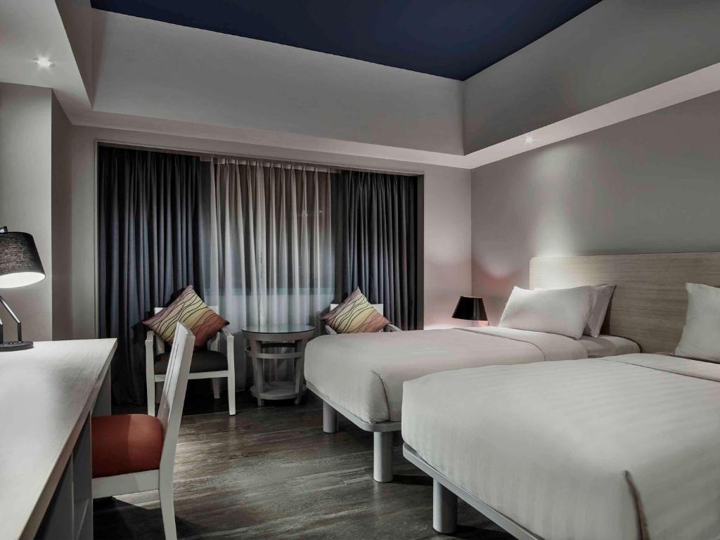 Двухместный (Улучшенный двухместный номер с 2 односпальными кроватями) отеля Mercure Convention Center Ancol, Джакарта