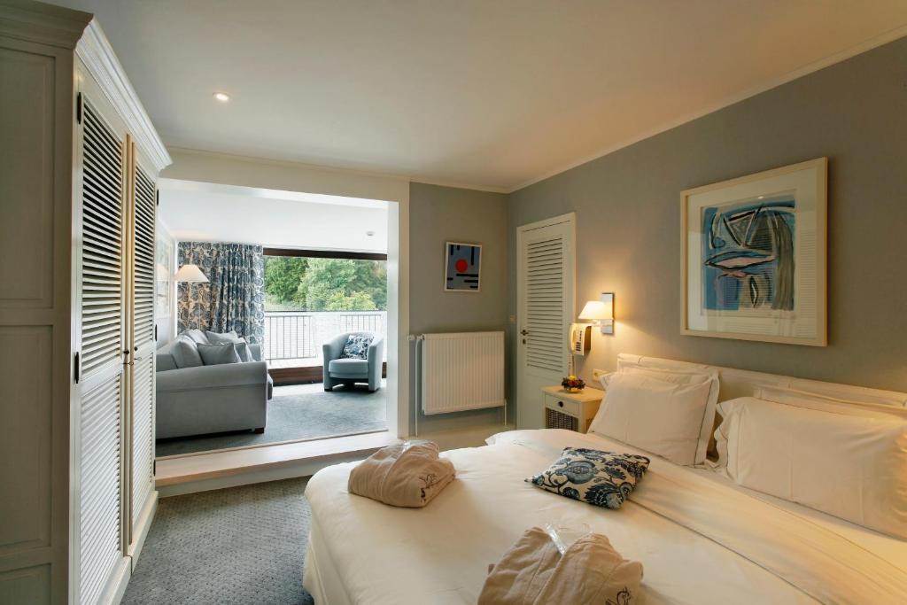 Двухместный (Двухместный номер с 1 кроватью или 2 отдельными кроватями и балконом) отеля Hotel des Bains & Wellness Spa Nuxe, Робертвиль
