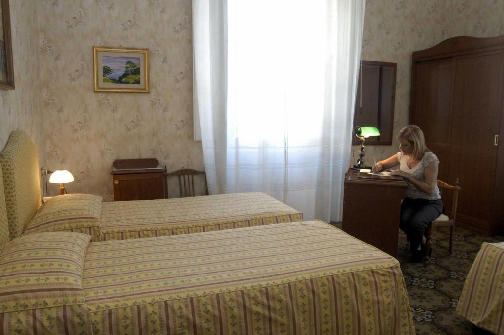 Двухместный (Двухместный номер с 2 отдельными кроватями) отеля Hotel Beatrice, Флоренция