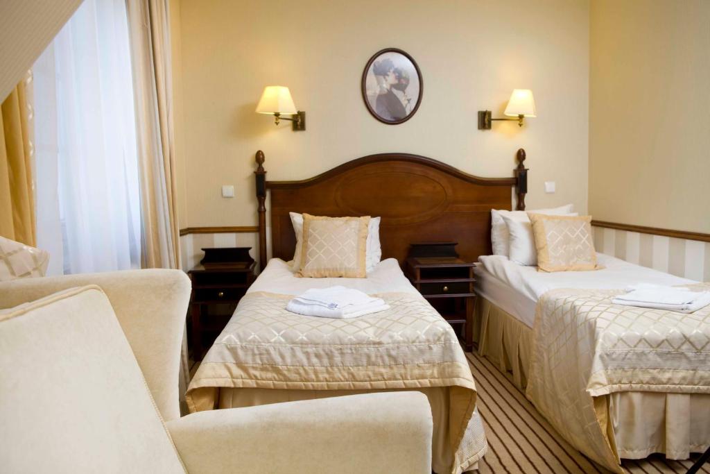 Двухместный (Двухместный номер с двуспальной кроватью и дополнительной кроватью) отеля Hotel St. Bruno, Гижицко