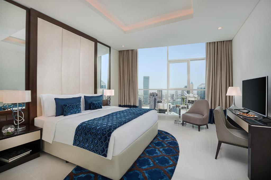 Апартаменты (Люкс с 1 спальней - Вид на небоскреб Бурдж-Халифа и фонтан) отеля DAMAC Maison Distinction, Дубай