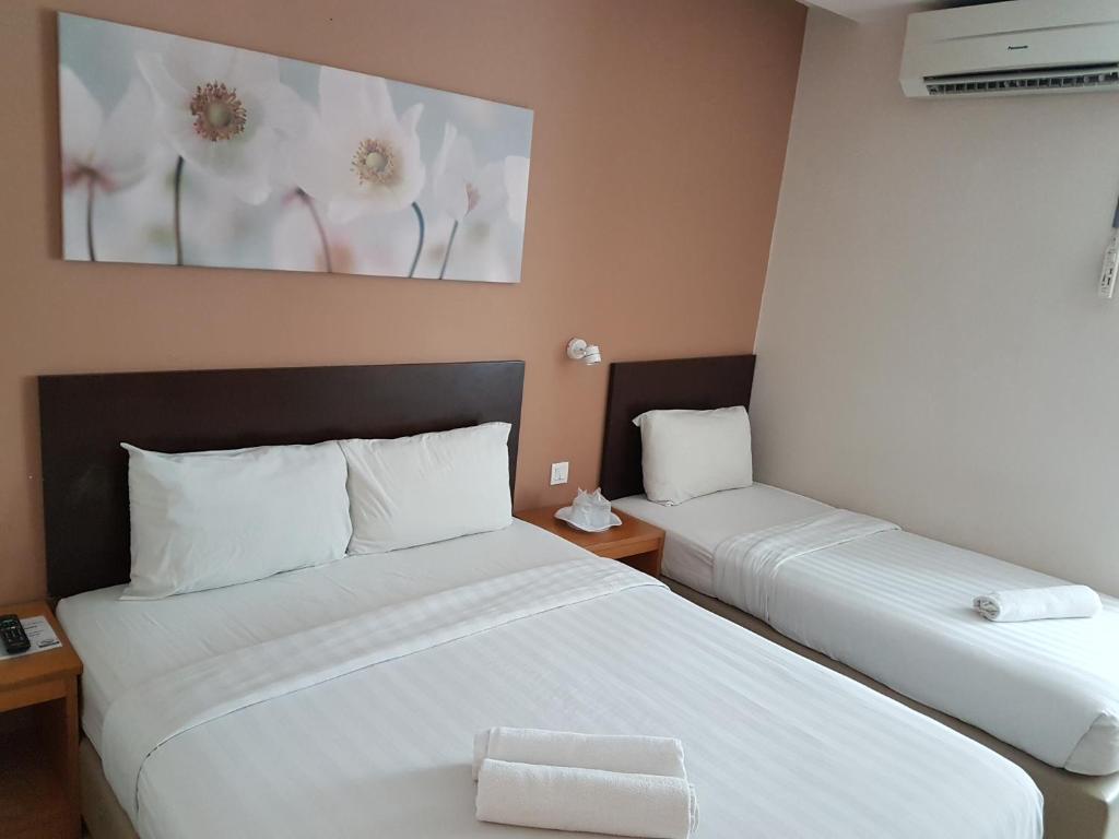 Трехместный (Представительский трехместный номер) отеля Hotel Asia, Лангкави