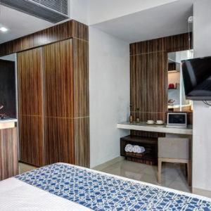 Двухместный (Двухместный номер Делюкс с 1 кроватью) отеля Sampit Residence Managed by FLAT06, Джакарта