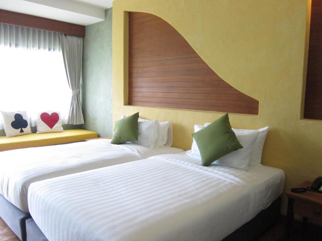 Двухместный (Улучшенный двухместный номер с 2 отдельными кроватями и видом на сад) курортного отеля Koh Kood Paradise Beach, Ко Куд