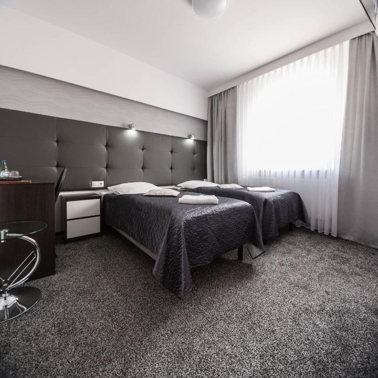 Двухместный (Двухместный номер с 2 отдельными кроватями) отеля Hotel Junior, Краков
