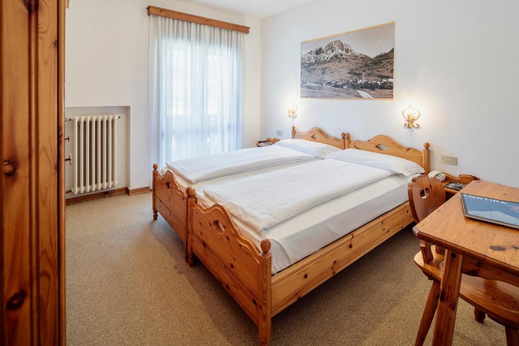 Двухместный (Двухместный номер с 1 кроватью или 2 отдельными кроватями) отеля Hotel Al Larin, Кортина-д'Ампеццо