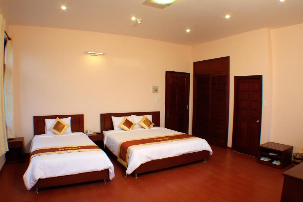 Двухместный (Двухместный номер Делюкс с 2 отдельными кроватями) отеля Ky Hoa Hotel Da Lat, Далат