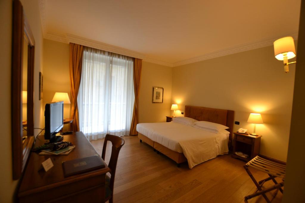 Двухместный (Стандартный двухместный номер с 1 кроватью или 2 отдельными кроватями) отеля Katane Palace Hotel, Катания