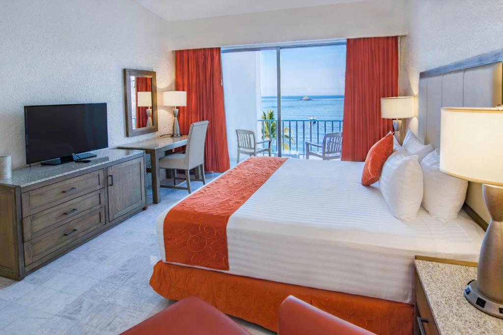 Двухместный (Standard Room with Ocean View ( 2 Adults, 1 Child)) курортного отеля Tesoro Manzanillo - Все включено, Мансанильо