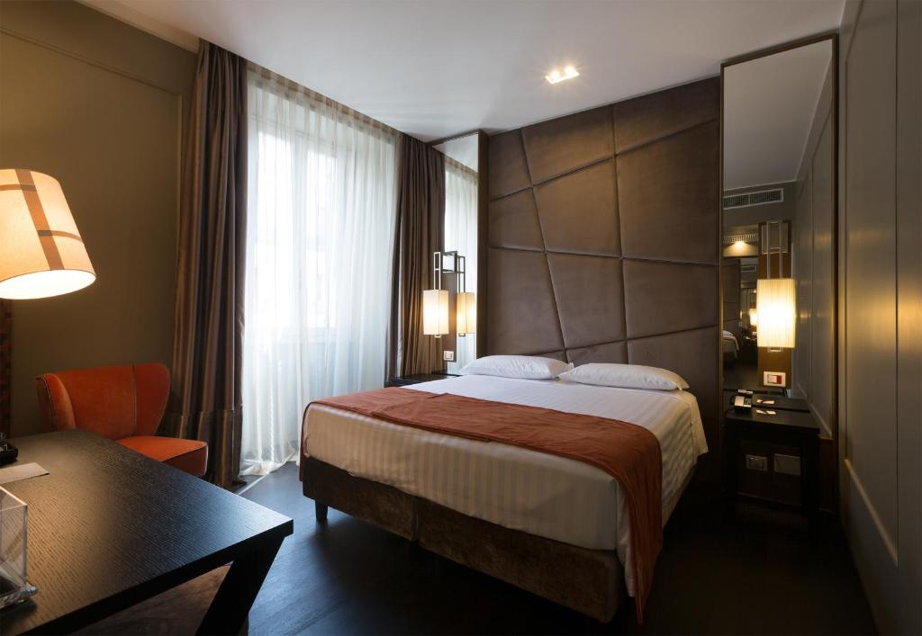 Двухместный (Двухместный номер Делюкс с 1 кроватью или 2 отдельными кроватями) отеля Stendhal Dependance Luxury Suites, Рим