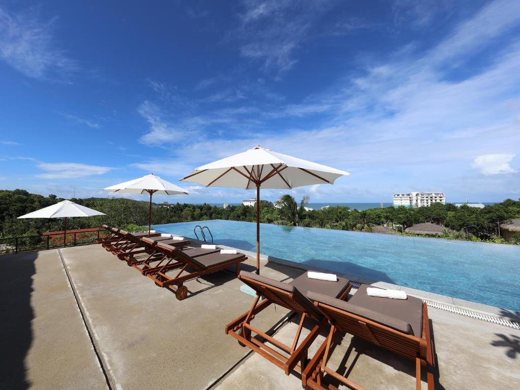 Двухместный (Предложение «Каникулы» — Номер Делюкс Garden + трансфер от/до аэропорта + бесплатное предоставление номера более высокой категории (в зависимости от наличия возможности)) курортного отеля Lahana Resort Phu Quoc & Spa, Дуонг-Донг