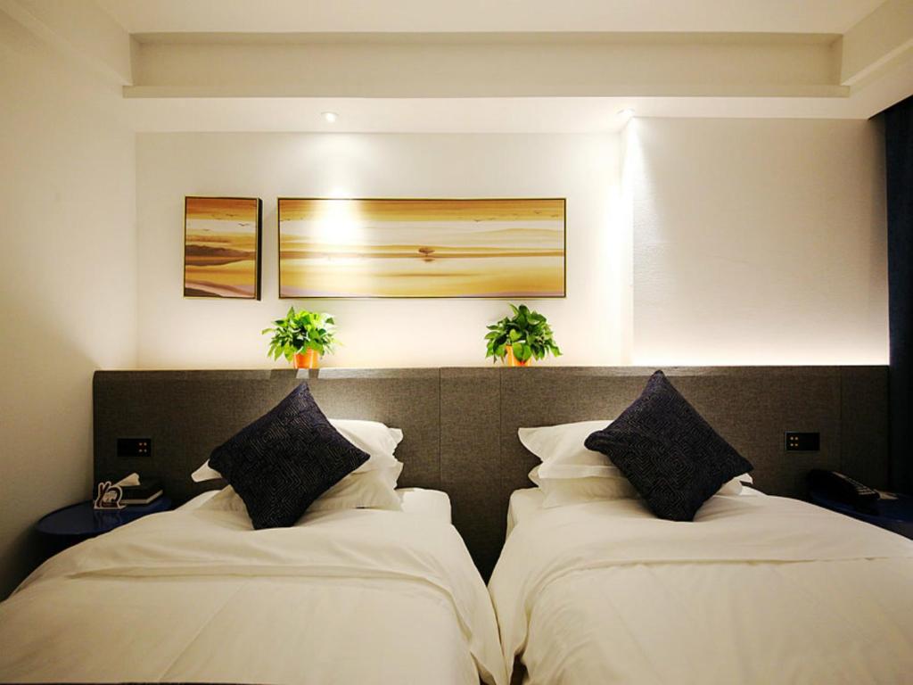 Двухместный (Улучшенный двухместный номер с 2 отдельными кроватями) отеля Lanmei Boutique Hotel Xiyuan Branch Lanzhou, Ланьчжоу