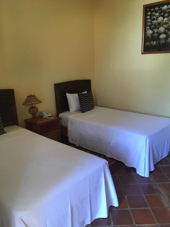 Четырехместный (Четырехместный номер с общей ванной комнатой) отеля Hotel Regalo del Alma, Текискиаппан