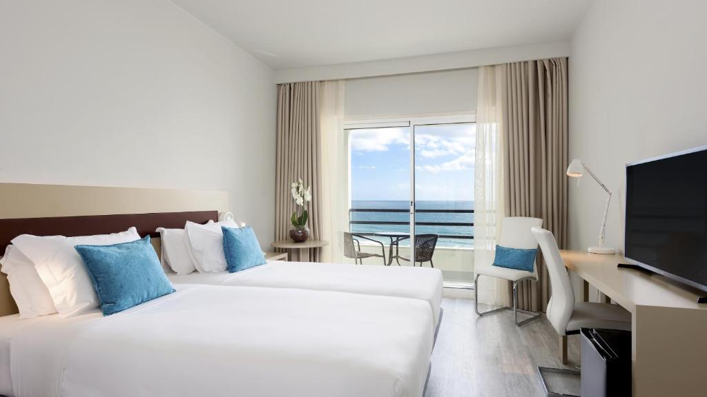 Двухместный (Двухместный номер с 2 отдельными кроватями и видом на море) отеля Tryp Lisboa Caparica Mar, Кошта-да-Капарика