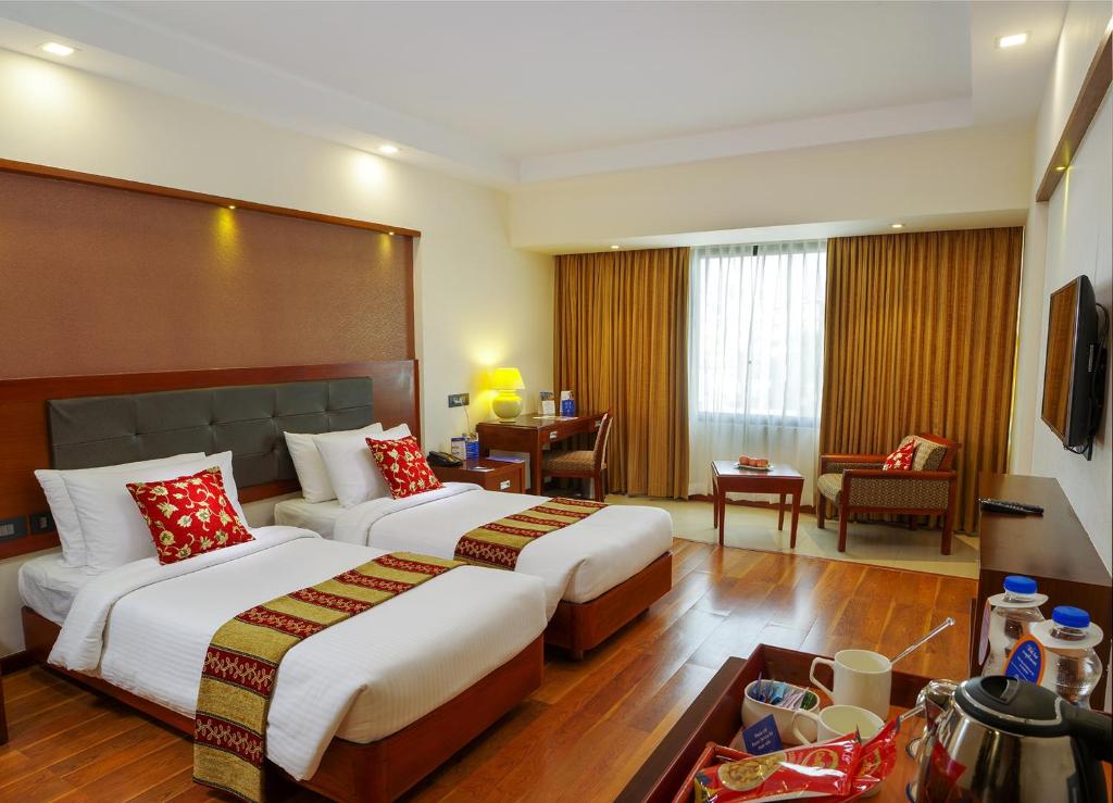 Двухместный (Клубный двухместный номер с 1 кроватью) отеля Classic Sarovar Portico Trivandrum, Тривандрум