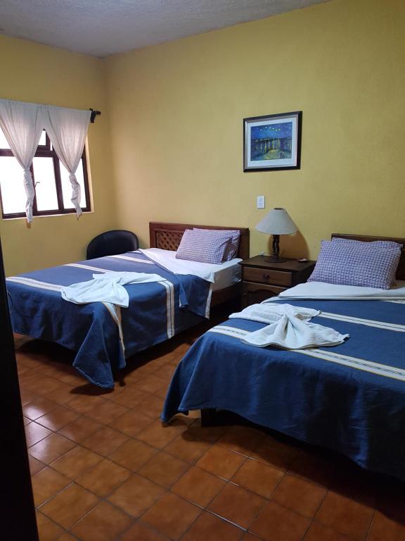 Двухместный (Двухместный номер с 2 отдельными кроватями) отеля Hotel Nuevo Cupatitzio, Уруапан