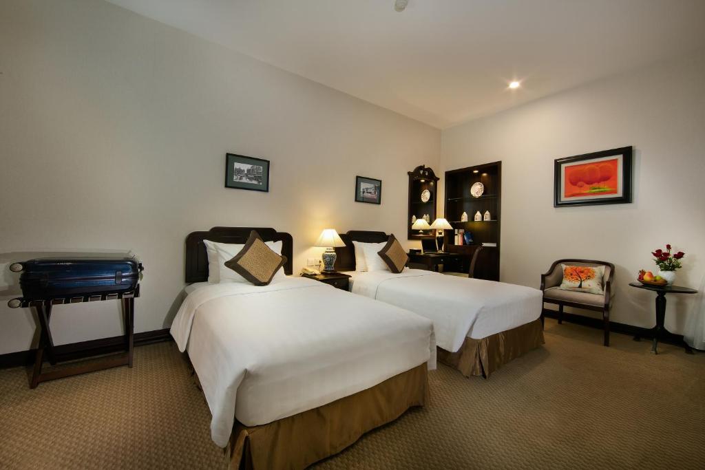 Двухместный (Классический двухместный номер с 1 кроватью или 2 отдельными кроватями) отеля Zephyr Suites Boutique Hotel, Ханой