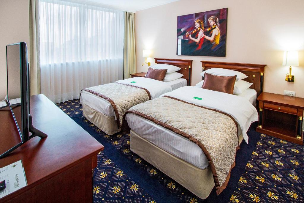 Двухместный (Двухместный номер Делюкс с 1 кроватью или 2 отдельными кроватями) отеля Hotel Sloboda Šabac, Шабац