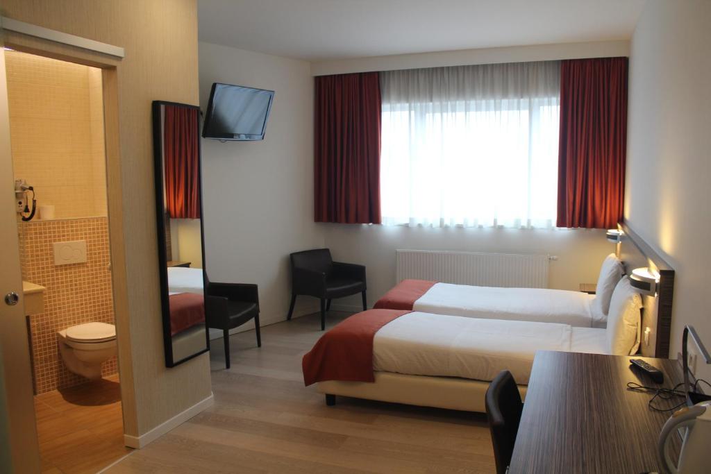 Двухместный (Стандартный двухместный номер с 2 отдельными кроватями) отеля Hotel Taormina Brussels Airport, Брюссель