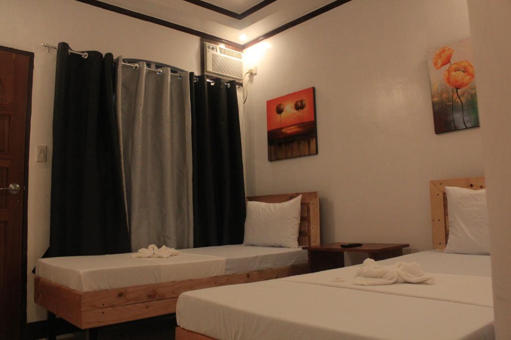 Двухместный (Стандартный двухместный номер с 2 отдельными кроватями) отеля Macky's Hidden Inn, Корон