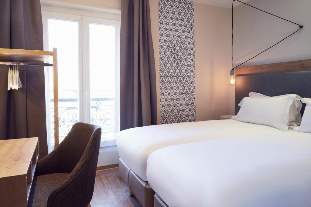Двухместный (Стандартный двухместный номер с 2 отдельными кроватями) отеля Hôtel Maison Montgrand - Vieux Port, Марсель