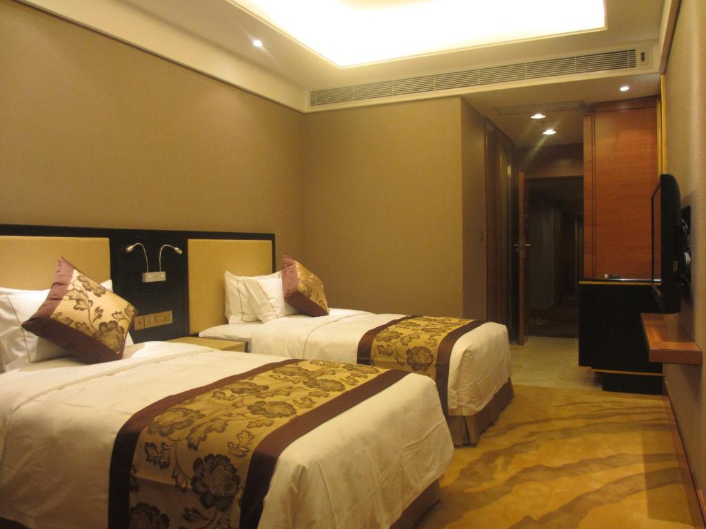 Двухместный (Улучшенный двухместный номер с 2 отдельными кроватями) отеля Vertical City Hotel Guangzhou, Гуанчжоу