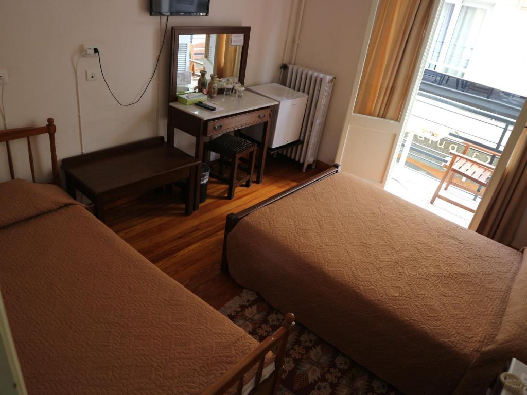 Двухместный (Стандартный двухместный номер с 2 отдельными кроватями) отеля Acropolis House, Афины