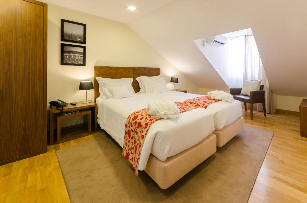 Двухместный (Стандартный двухместный номер с 1 кроватью или 2 отдельными кроватями) отеля Hotel Borges Chiado, Лиссабон