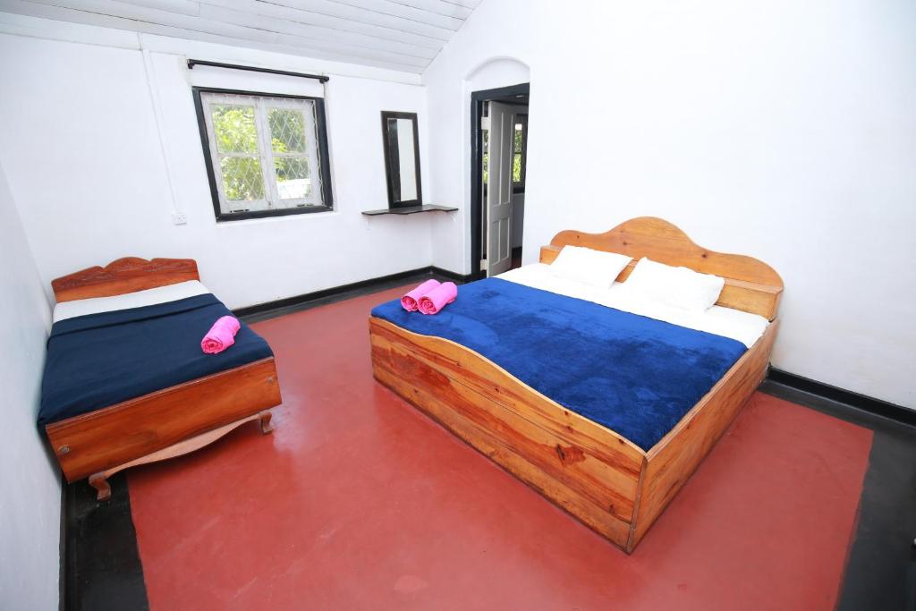 Двухместный (Стандартный двухместный номер с 1 кроватью или 2 отдельными кроватями и видом на сад) гостевого дома Woodlands Bungalow, Бандаравела