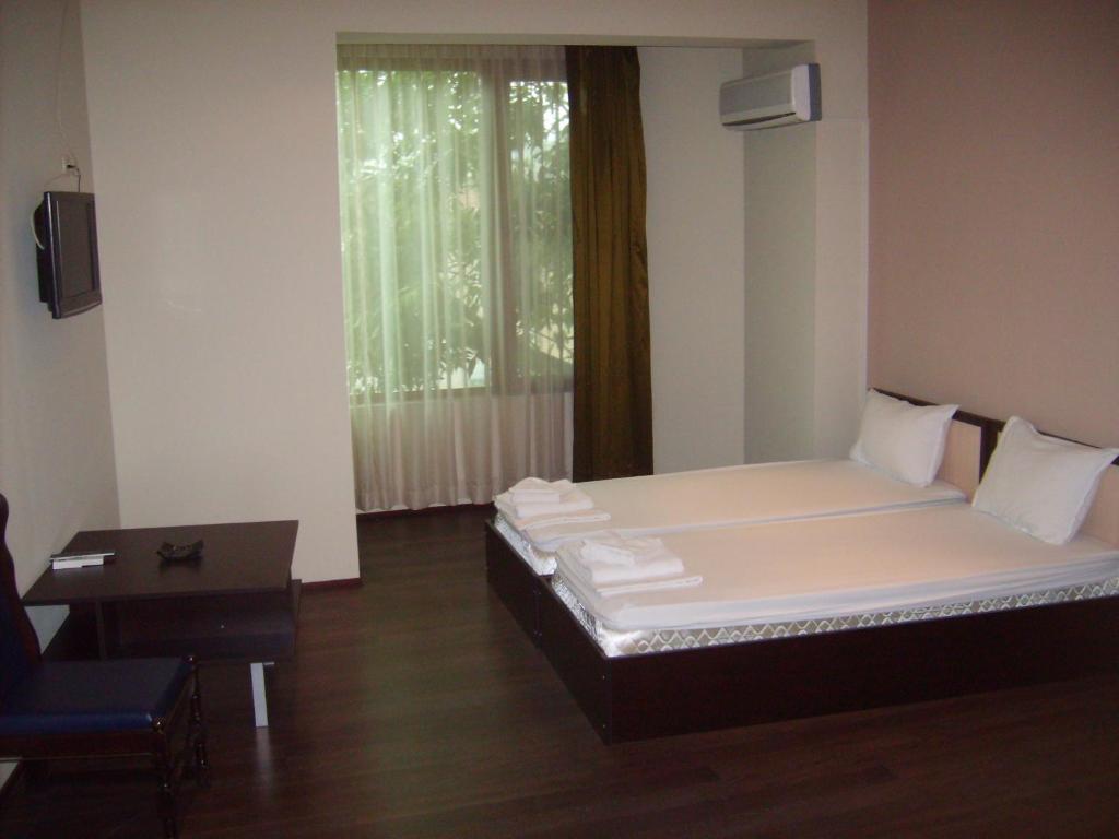 Двухместный (Двухместный номер Делюкс с 1 кроватью или 2 отдельными кроватями) отеля Hotel Trakart Residence, Пловдив