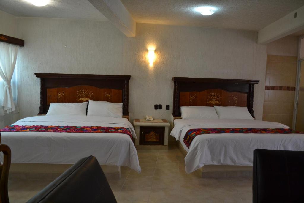 Сьюит (Семейный люкс) отеля Hotel Teotihuacan, Сан-Хуан-Теотиуакан