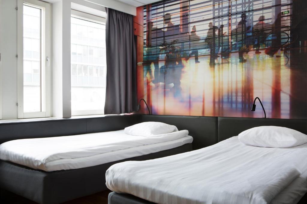 Двухместный (Улучшенный двухместный номер с 1 кроватью или 2 отдельными кроватями) отеля Comfort Hotel Xpress Stockholm Central, Стокгольм