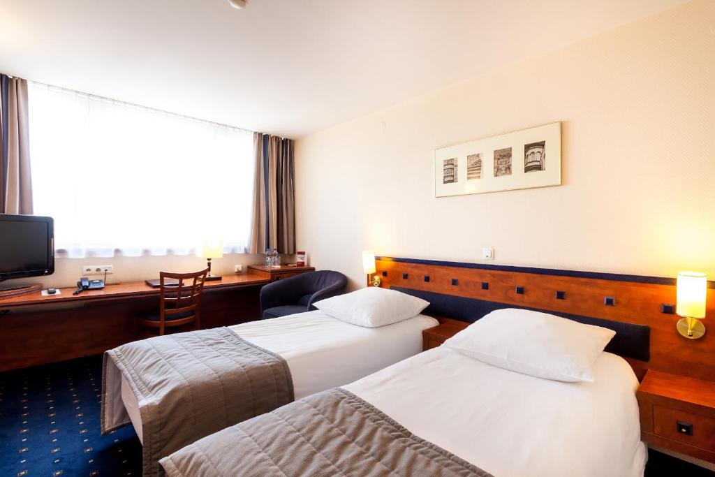 Двухместный (Двухместный номер с 1 кроватью или 2 отдельными кроватями) отеля Qubus Hotel Legnica, Легница