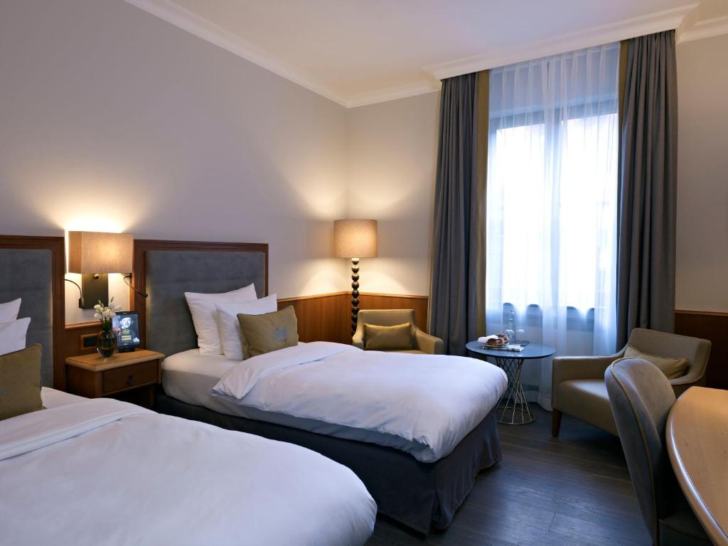 Двухместный (Улучшенный двухместный номер с 2 отдельными кроватями) отеля Platzl Hotel - Superior, Мюнхен