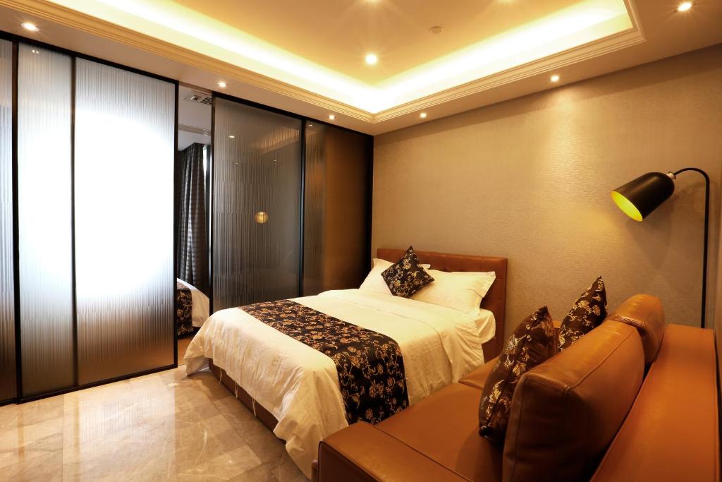 Двухместный (Номер-студио Делюкс с 2 отдельными кроватями) апартамента Boman Holiday Apartment Jie Deng Du Hui Branch, Гуанчжоу
