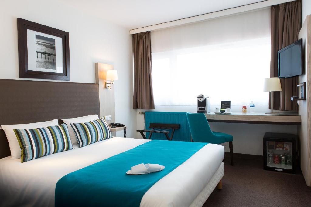 Двухместный (Улучшенный двухместный номер с 1 кроватью) отеля Hotel Lille Europe, Лилль