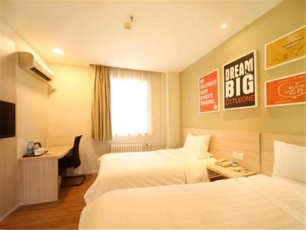 Двухместный (Двухместный номер с 2 отдельными кроватями) отеля Hanting Hotel Xi'an 1st Gaoxin Road Branch, Сиань