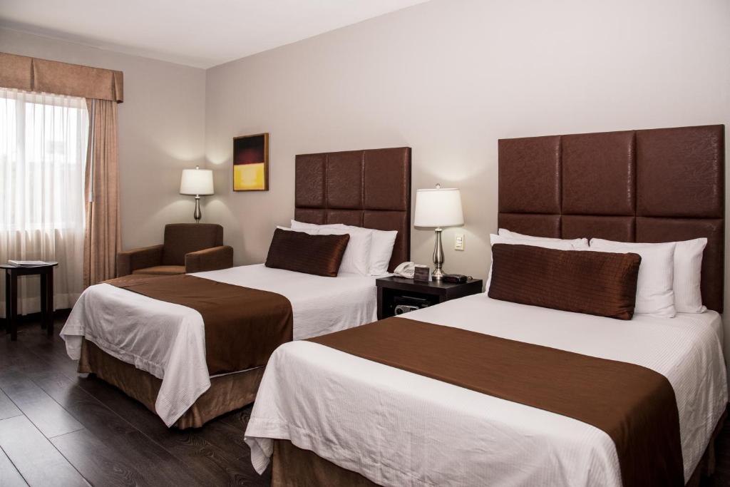 Четырехместный (Двухместный номер с 2 двуспальными кроватями - Для некурящих) отеля Best Western PLUS Monterrey Airport, Монтеррей