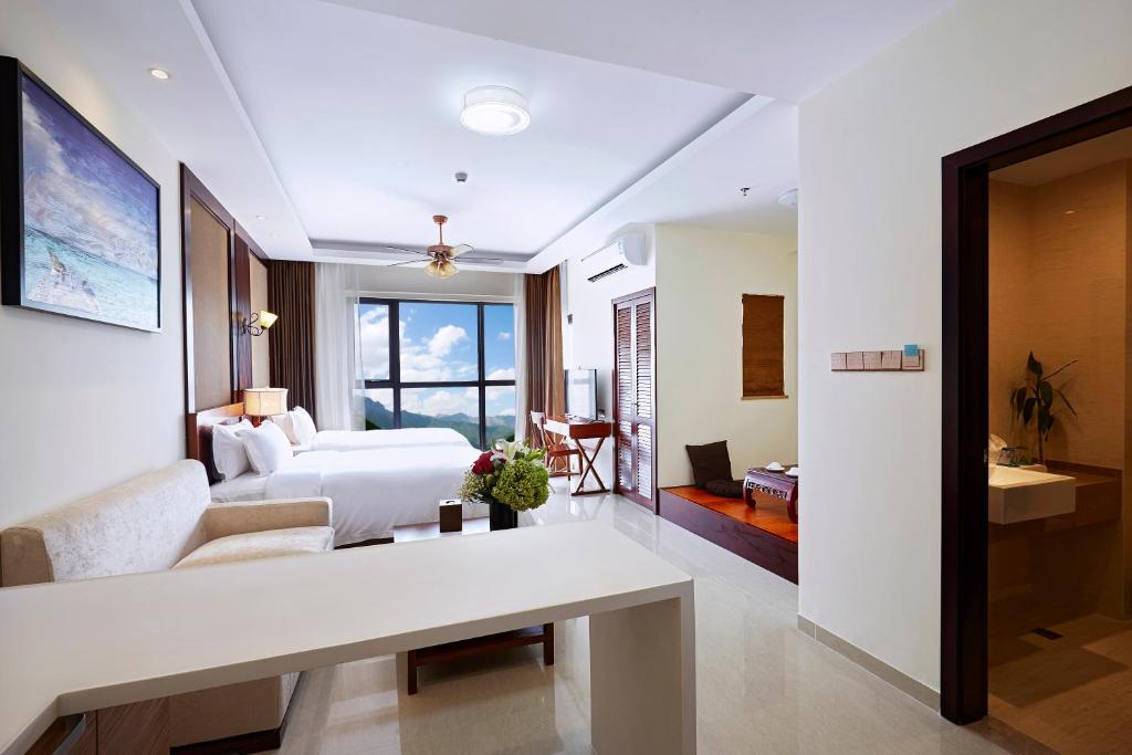 Двухместный (Двухместный номер с 1 кроватью или 2 отдельными кроватями, вид на город) отеля Paxton Vacances Hotel & Resorts Sanya, Санья