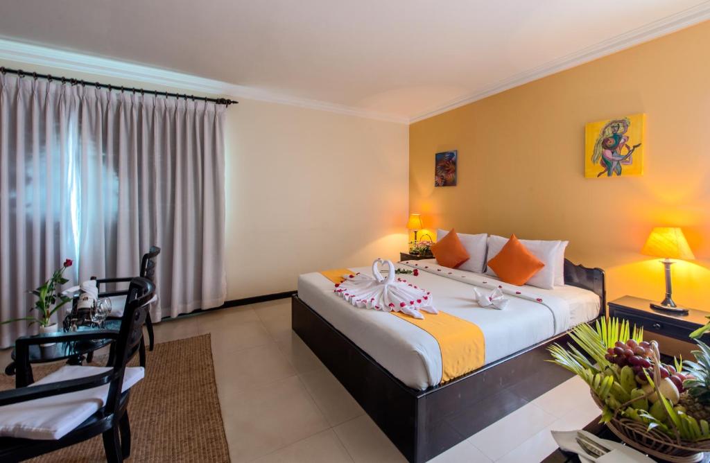 Двухместный (Двухместный номер Делюкс с 1 кроватью или 2 отдельными кроватями - Бесплатный трансфер из аэропорта) отеля Angkor Panoramic Boutique Hotel, Сием Рип