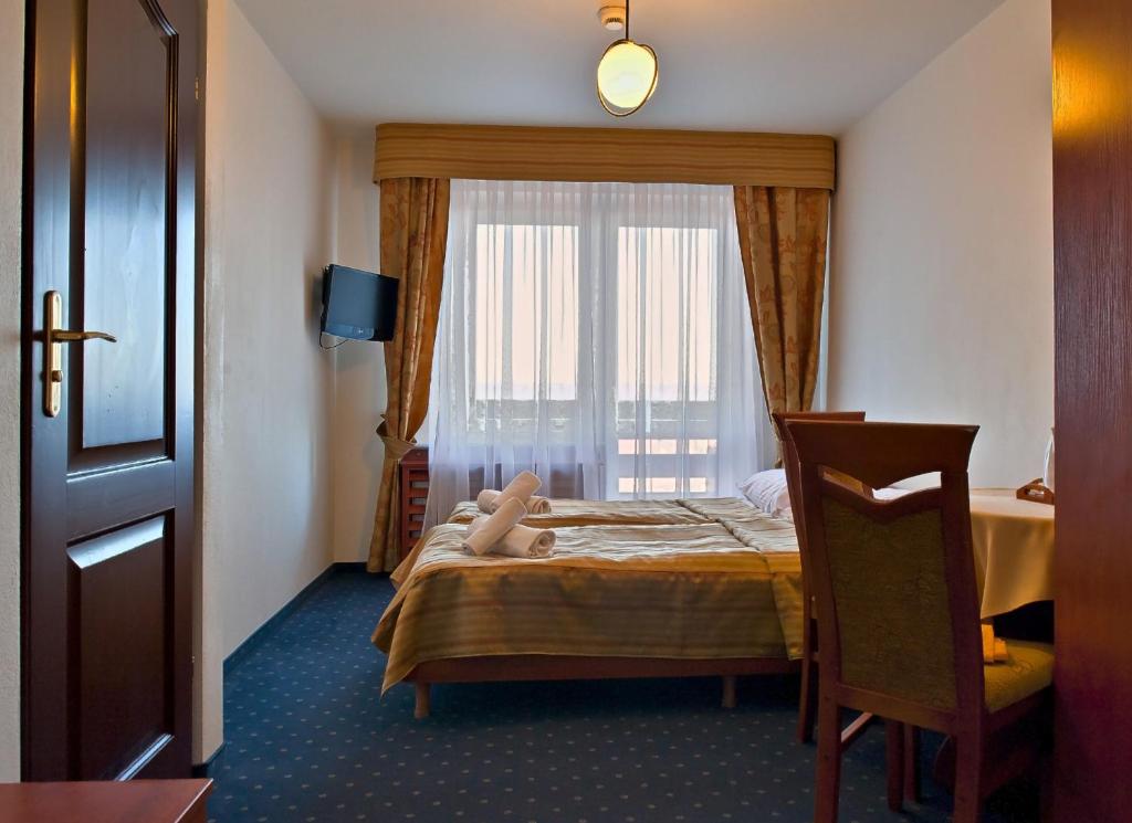 Двухместный (Двухместный номер с 1 кроватью или 2 отдельными кроватями) отеля Giewont, Мужасихле