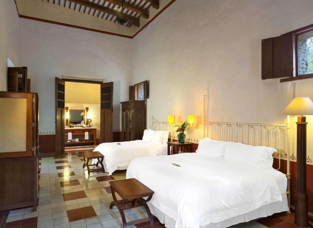 Двухместный (1 Bedroom Junior Suite, 2 Double, Garden view) отеля Hacienda Santa Rosa a Luxury Collection Hotel, Санта-Роза