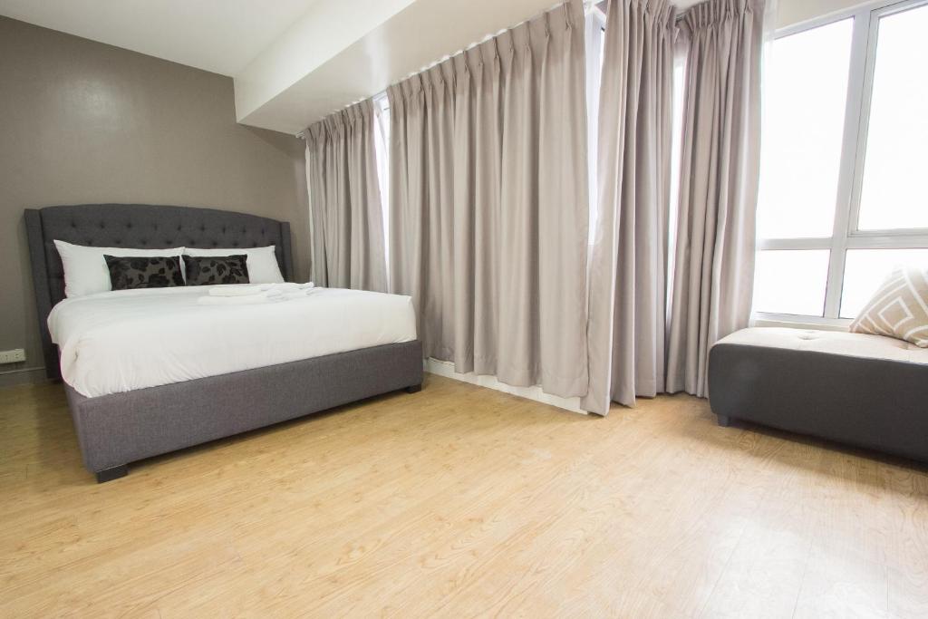 Апартаменты (Апартаменты с 1 спальней), Oasis Regency @ Fort Victoria BGC