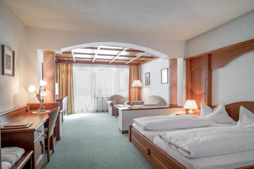 Двухместный (Двухместный номер Делюкс с 1 кроватью) отеля Wellness & Relax Hotel Milderer Hof, Нойштифт