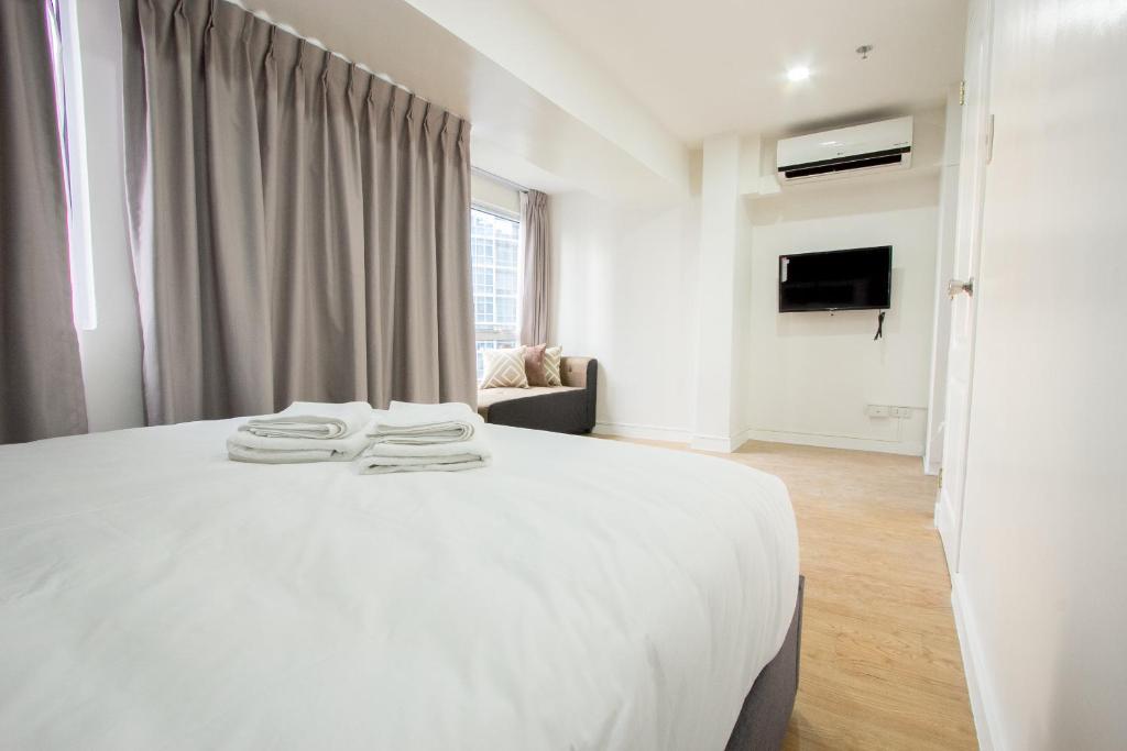 Апартаменты (Апартаменты с 1 спальней), Oasis Regency @ Fort Victoria BGC