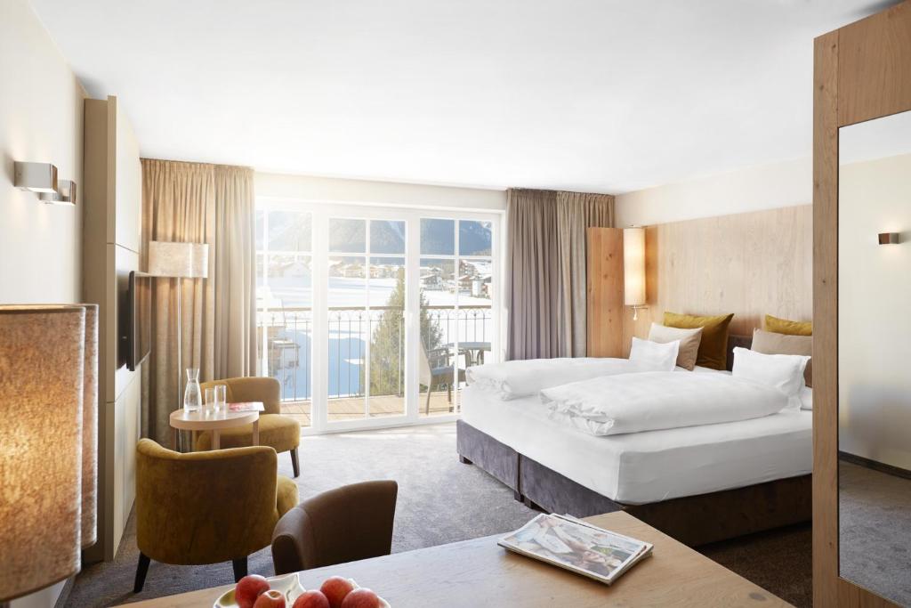 Двухместный (Улучшенный двухместный номер с 1 кроватью и видом на горы) отеля Entners am See, Визинг