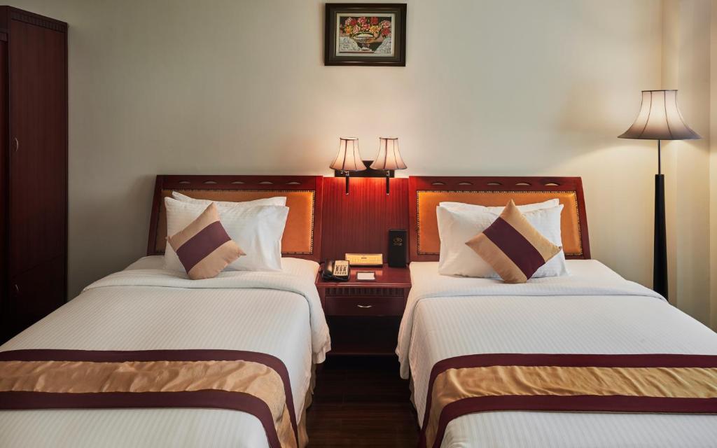 Двухместный (Улучшенный двухместный номер с 1 кроватью или 2 отдельными кроватями) отеля Phnom Penh Hotel, Пномпень