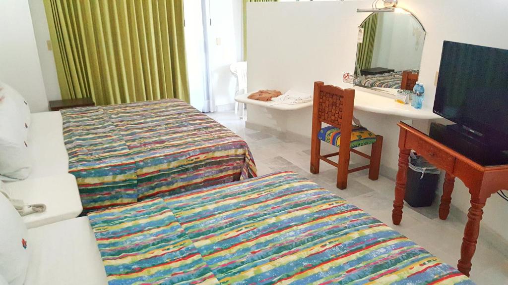 Двухместный (Double Room with Sea  View- Beach Club) отеля Hotel La Alondra, Барра-де-Навидад