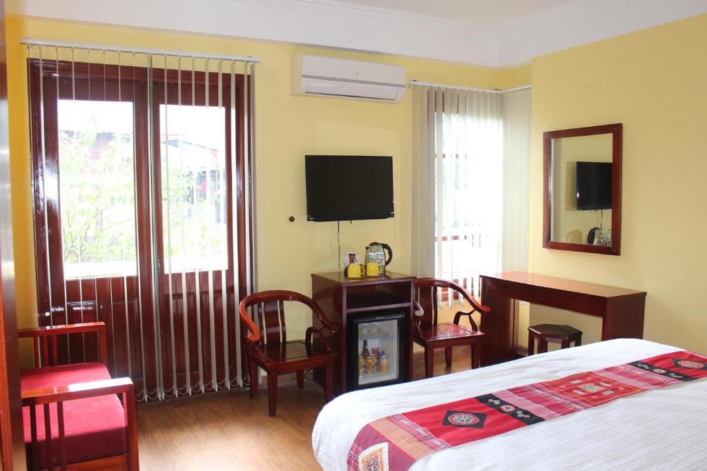 Двухместный (Улучшенный двухместный номер с 1 кроватью или 2 отдельными кроватями) отеля Fansipan View Sapa Hotel, Сапа